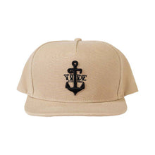 Load image into Gallery viewer, Tide Apparel Men's Anchor Snapback Cap in beige with anchor logo, ideal for outdoor activities and casual wear.