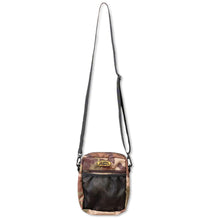 Load image into Gallery viewer, Lightweight Tide Apparel camo sling bag with adjustable strap and mesh pocket, perfect for on-the-water adventures.