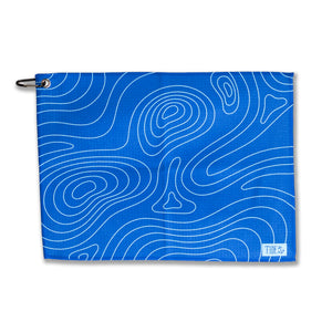 Contour Multi-Purpose Towel in blue with wave pattern, ideal for fishing, boating, and outdoor activities.