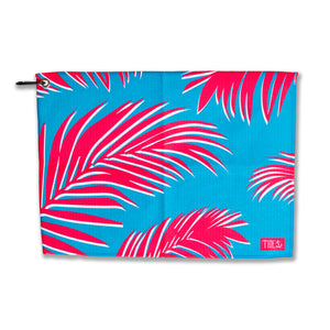 Troppo Multi-Purpose Towel with vibrant palm leaf design, ideal for fishing, boating, and everyday outdoor use.